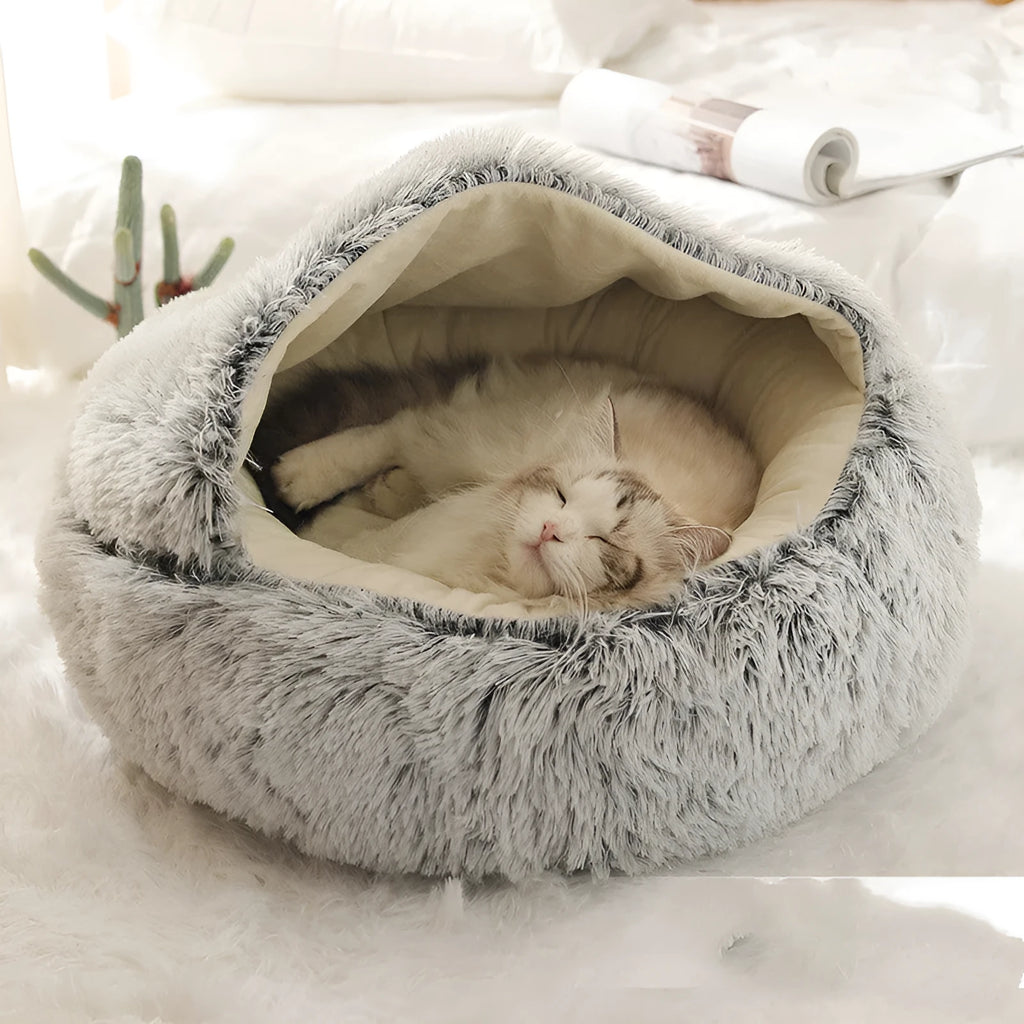 Cozy Cocoon pet bed in brown plush with hooded design, 40cm to 100cm sizes for dogs and cats.