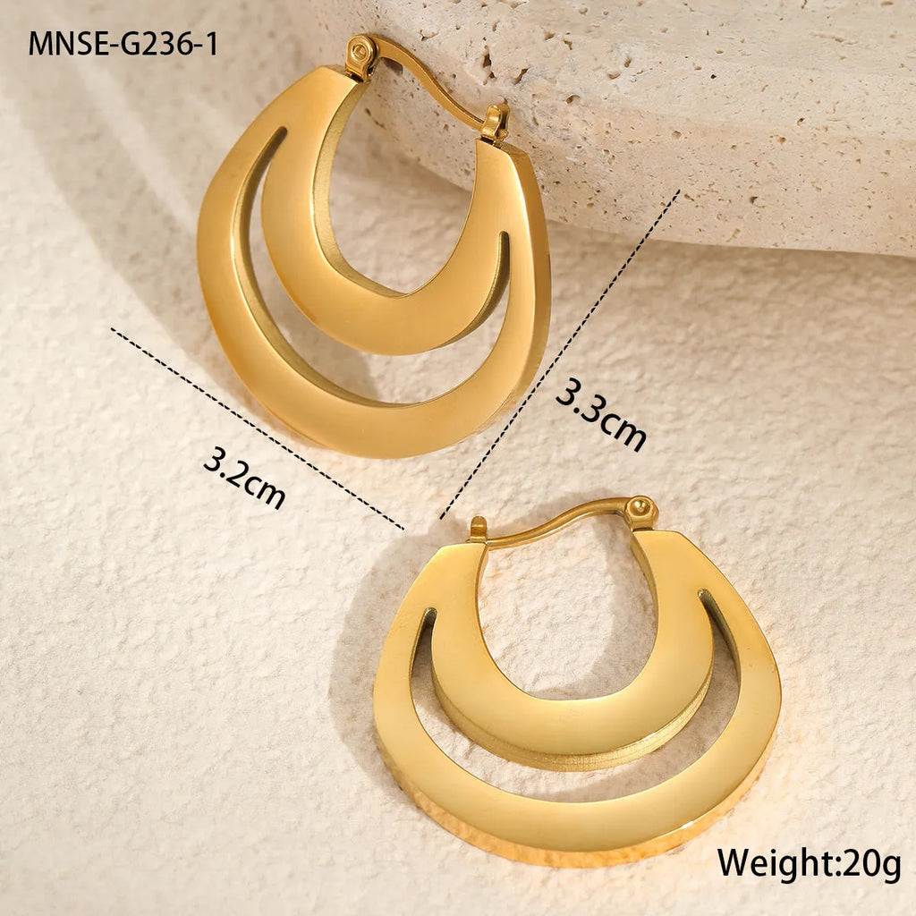 Geometric gold-plated French earrings with round ring elements, available in gold or steel colour
