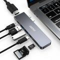 Aluminium USB-C multi-port adapter with SD card slot, HDMI, USB, and Thunderbolt ports