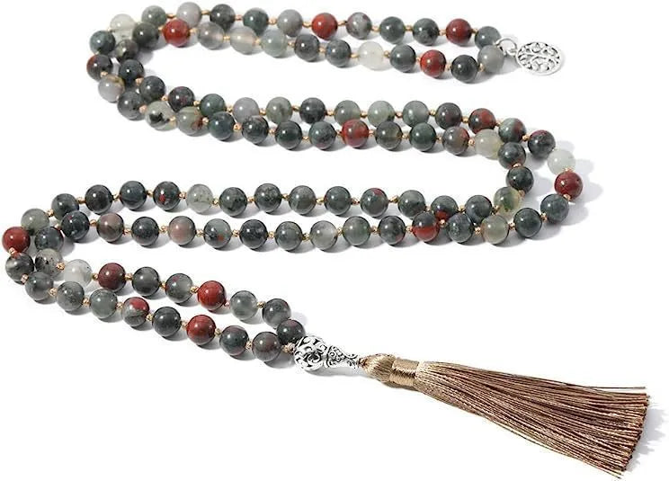 Long handmade necklace with 108 small round stone beads on a black cord, shown doubled up.