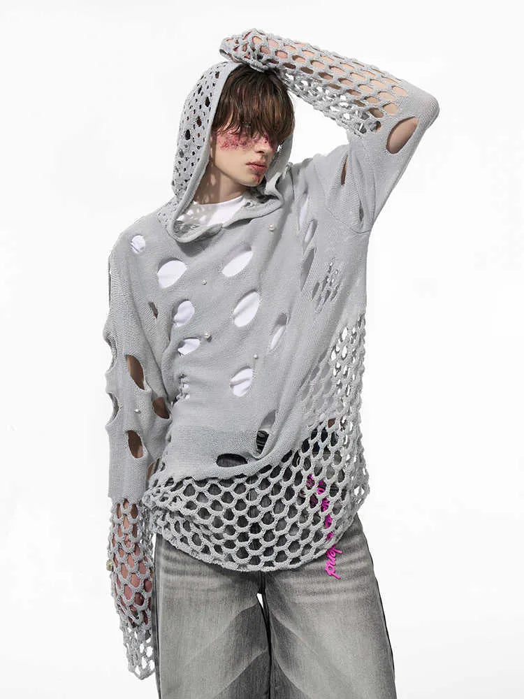 Black men's loose fit pullover hoodie with decorative pearls on the front of the hood.