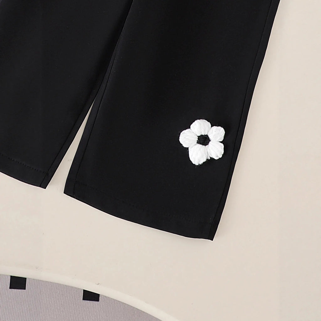 Baby girl cotton outfit set with white long-sleeved wool flower top and black trousers for toddlers 6 months to 3 years