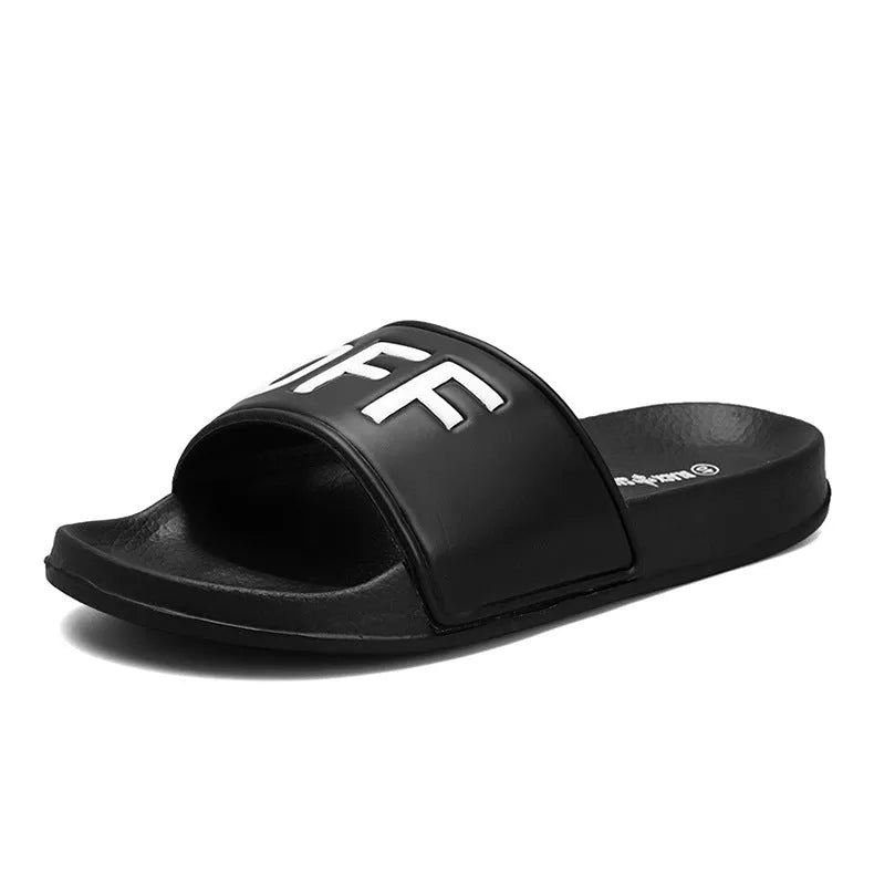 A pair of open-toe men's slippers with a rubber sole, shown in black and white colour options.