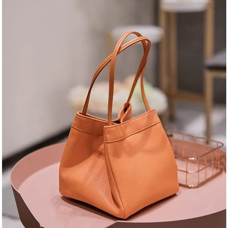 Small square PU bucket handbag in solid colour, niche design texture, women's handbag