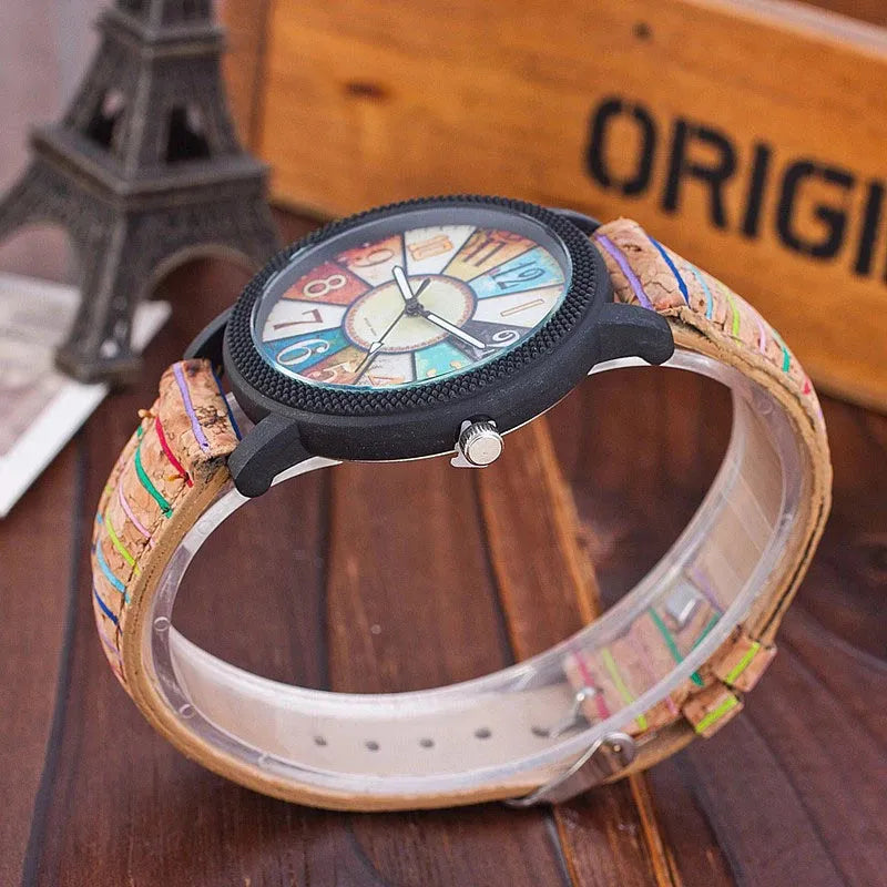 Women's vintage style leather strap quartz watch with 37mm round dial and stainless steel buckle