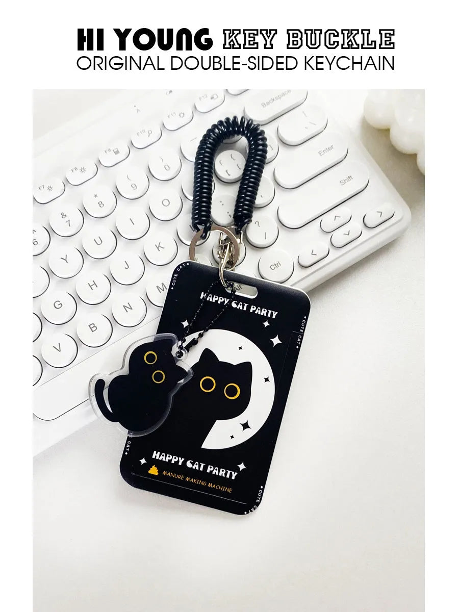 Plastic card sleeve with a cute black cat cartoon design and an attached keyring fob loop.