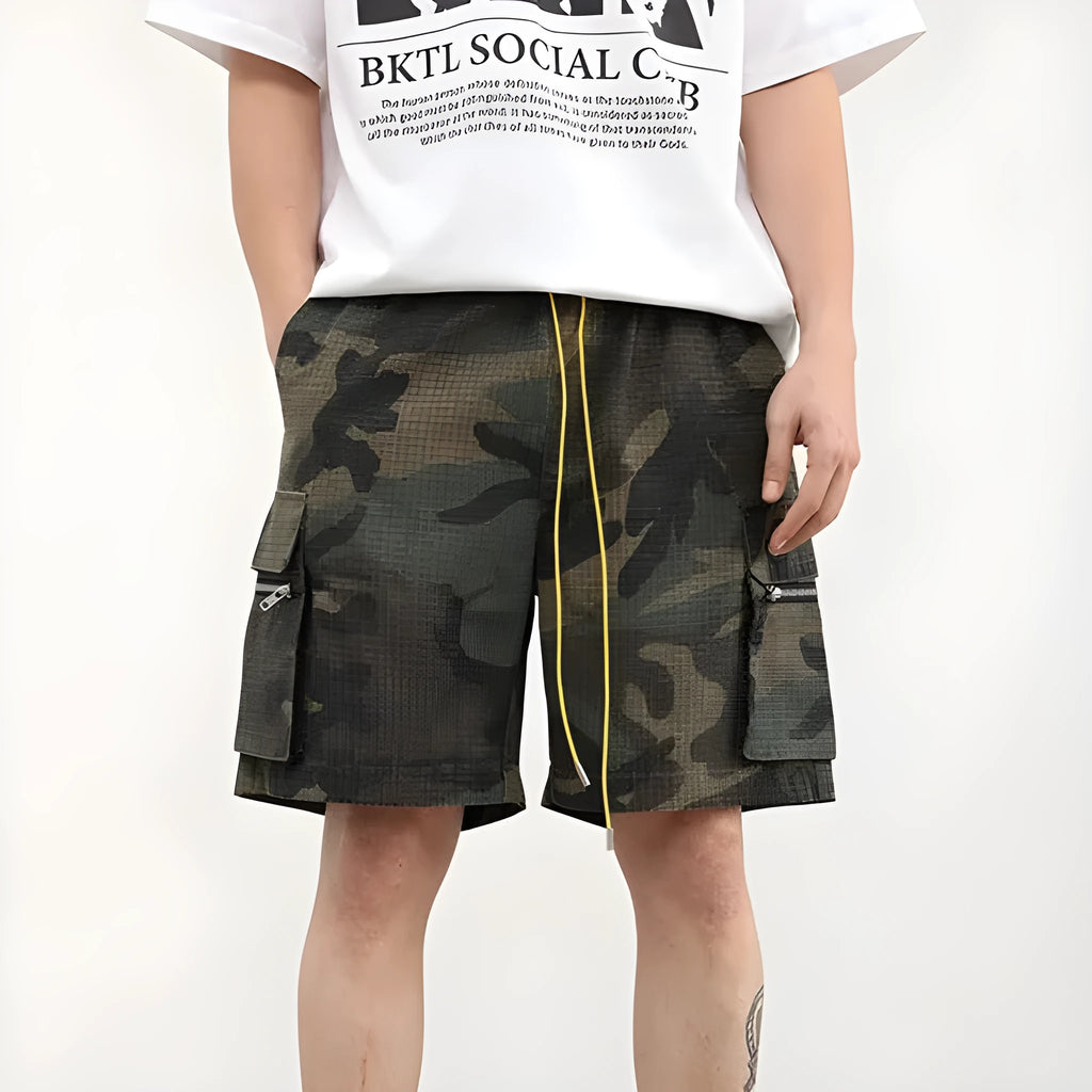Men's camouflage pattern work shorts with multiple pockets, cropped length, and mid waist design