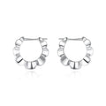 Sterling silver geometric hoop earrings with round design elements and electroplated finish