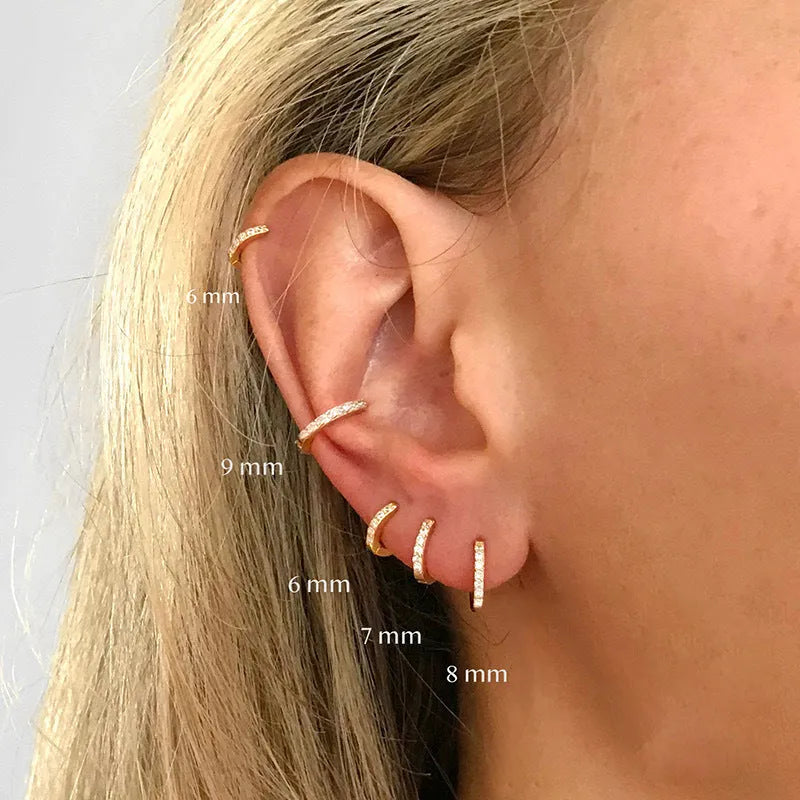 Circle zircon perforated stud earrings in gold, rose gold, and silver colours showing different size options