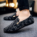Canvas casual lazy shoes with cloth upper and rubber sole in black, side view