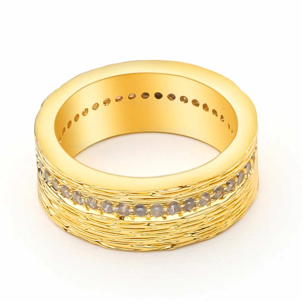 Gold geometric zircon women's ring on a white background.