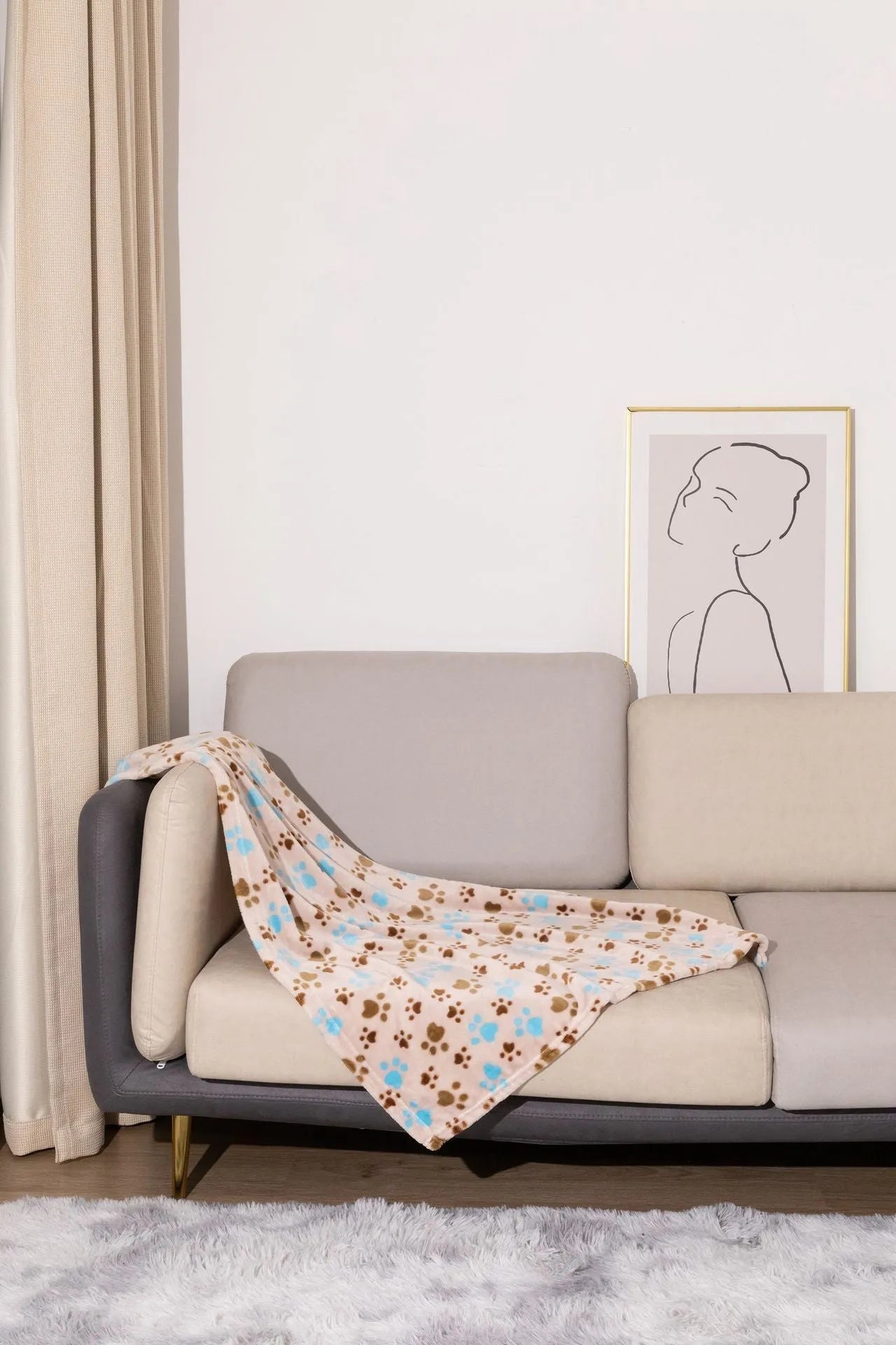 Blue dog cartoon print pet blanket laid flat, showing double-sided flannel texture.