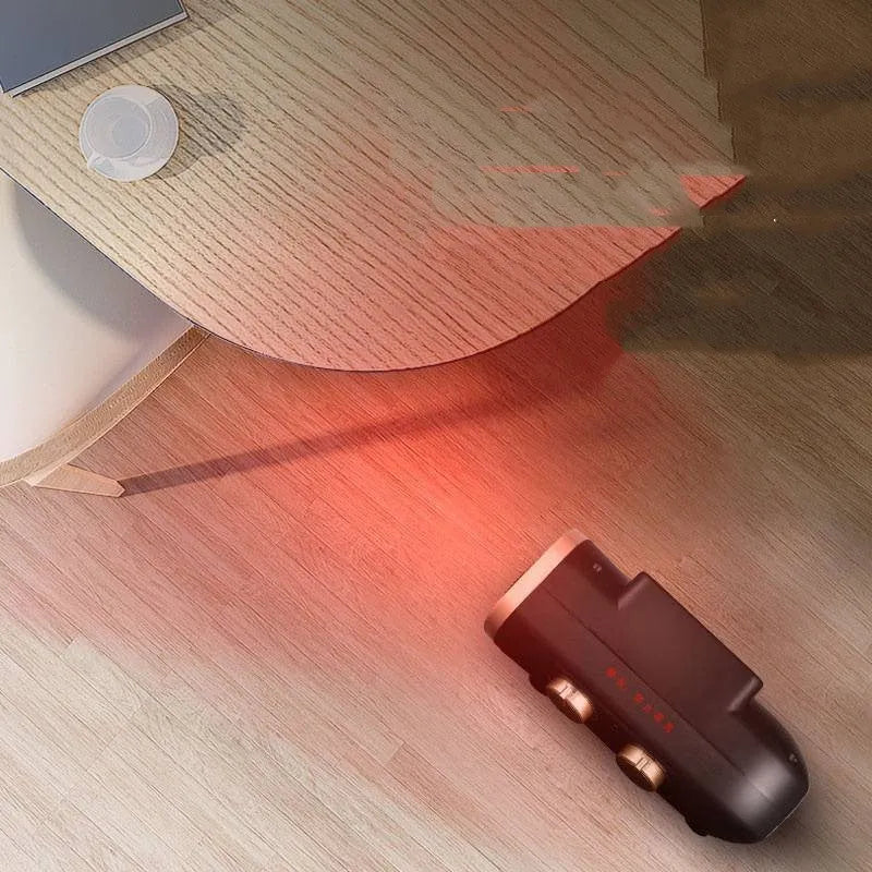 Compact white electric fan heater with mechanical control knobs on a wooden floor.