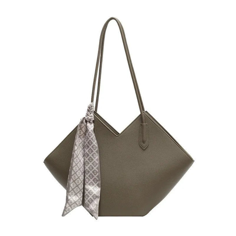 A beige women's large capacity PU shoulder bag with a square shape and a front sandwich pocket.