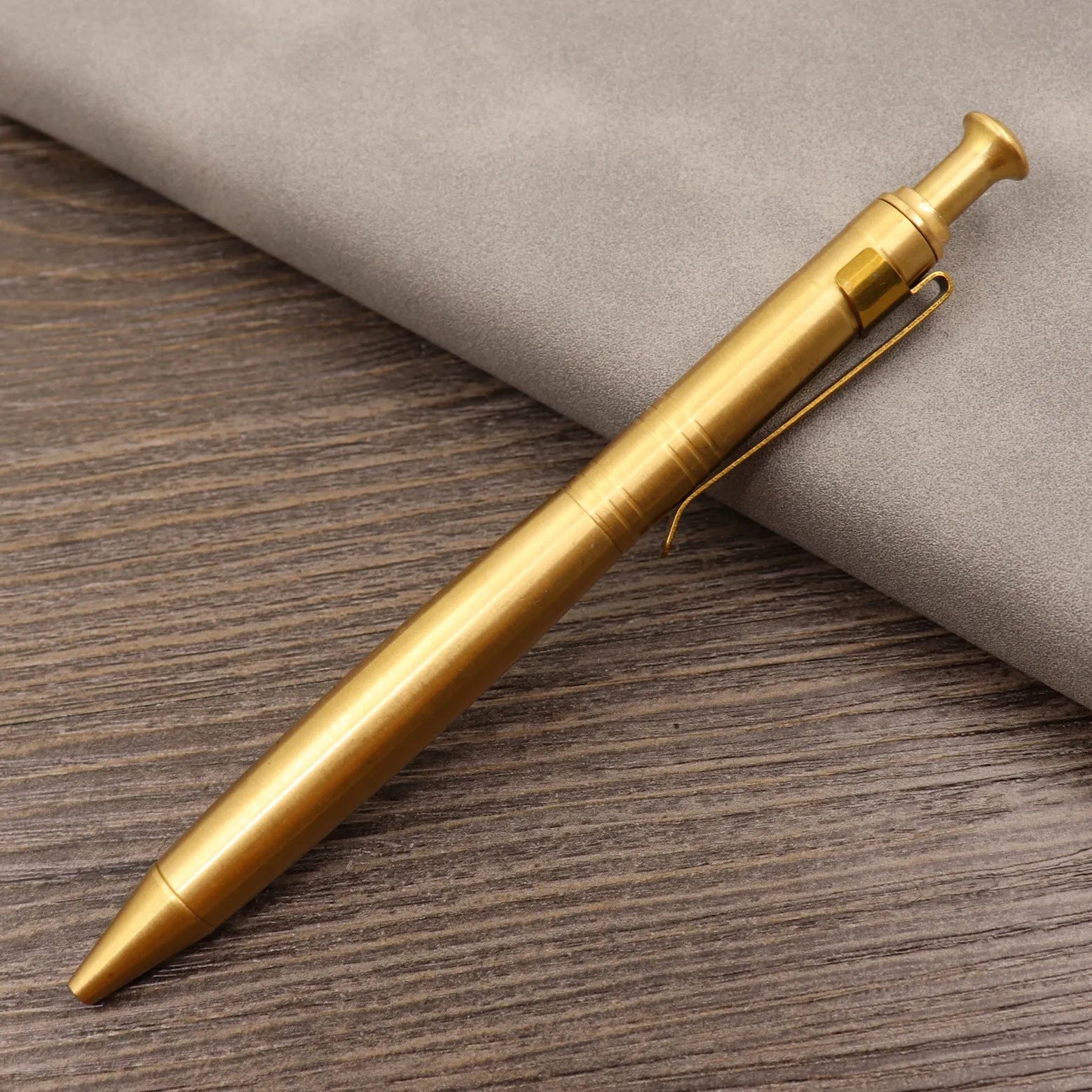 Brass tactical pen with retro colour finish and press mechanism