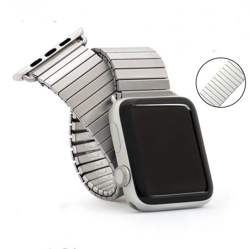 Silver stainless steel elastic Apple Watch band on a wrist, compatible with 38mm to 44mm cases