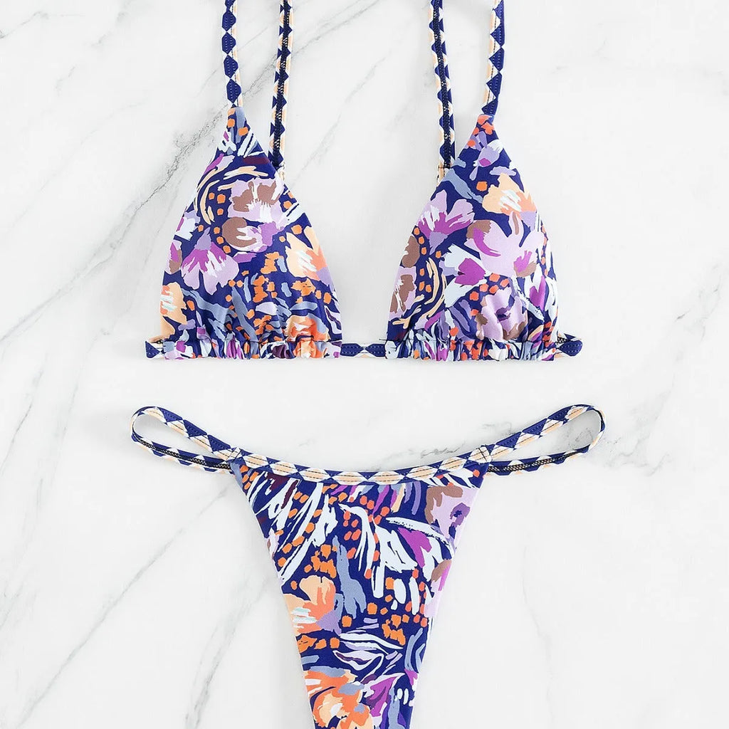 Women's floral print triangle bikini swimsuit with adjustable tie sides on white background