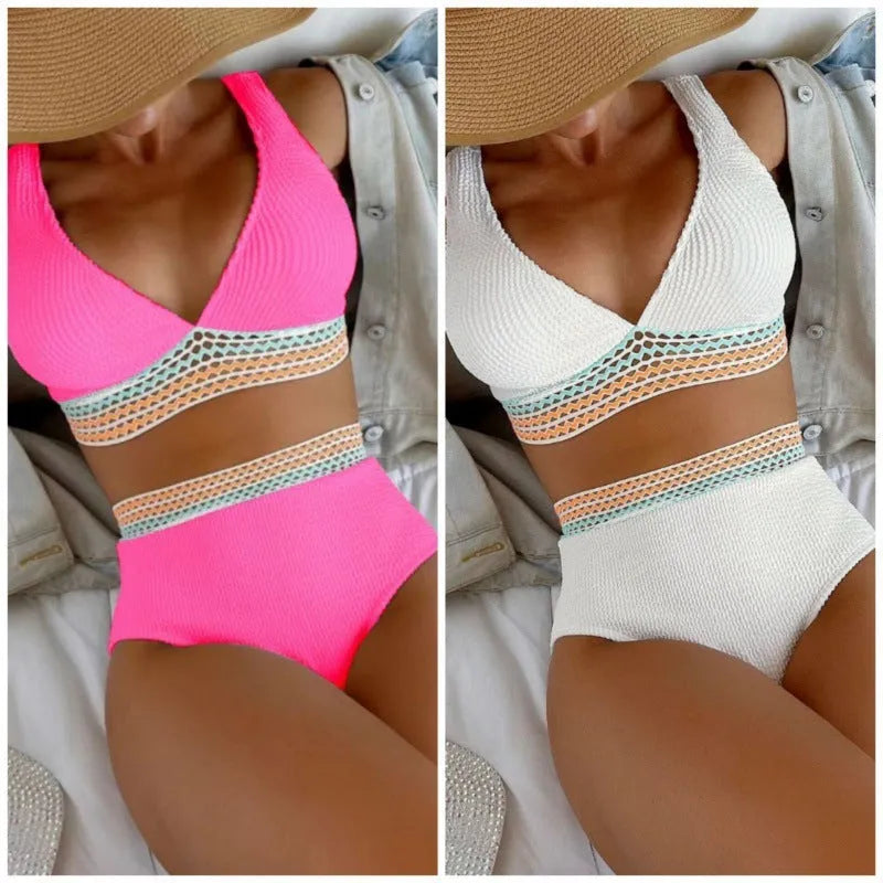 A pink high waist women's bikini brief with a split leg design, laid flat.