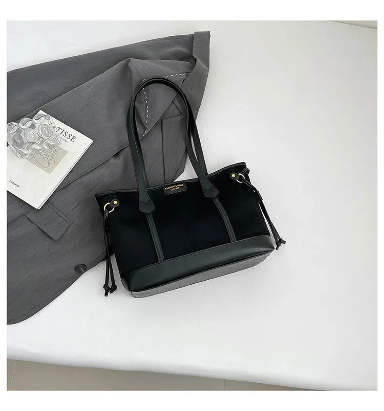 PU shoulder bag in horizontal square shape with double joint straps, slit pocket and sandwich zipper bag