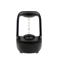 Black and white anti-gravity humidifier showing water droplet effect with USB cable