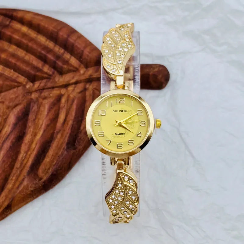 Stainless steel women's watch with round dial and vachette clasp in gold colour option