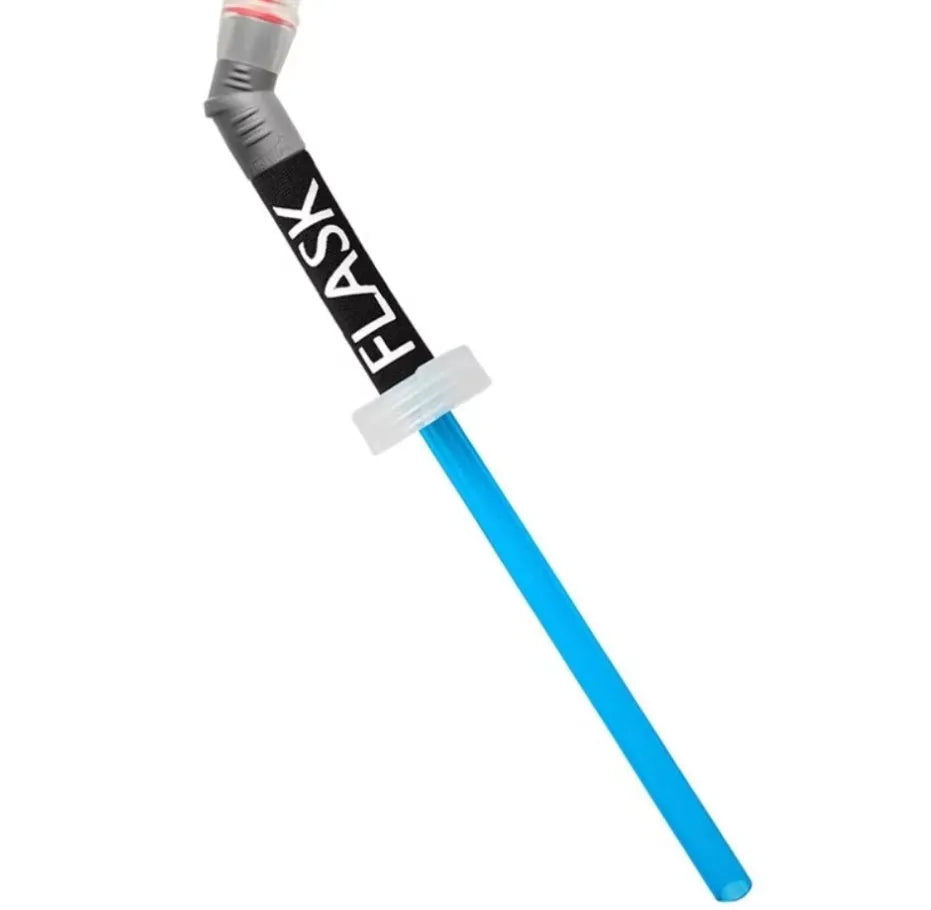 Close-up of a grey flexible plastic hydration straw with a textured grip and a blue silicone cap for mountain biking