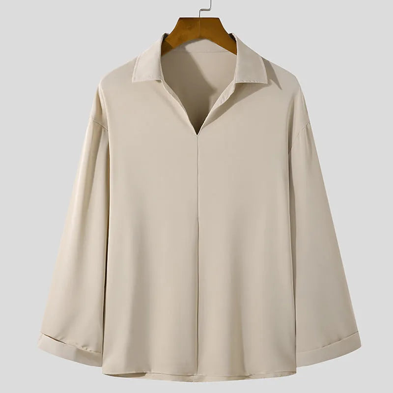 Men's loose lapel casual pullover shirt in solid colour on a hanger, shown in white, black, blue and skin tone options.