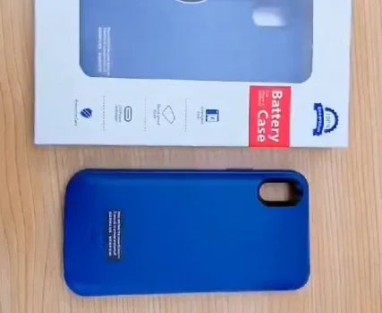 Shockproof silicone iPhone battery charging case in black, blue, pink, or white.