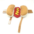 Red and beige hot dog costume coat for a small dog on a Dachshund, showing velcro closure.