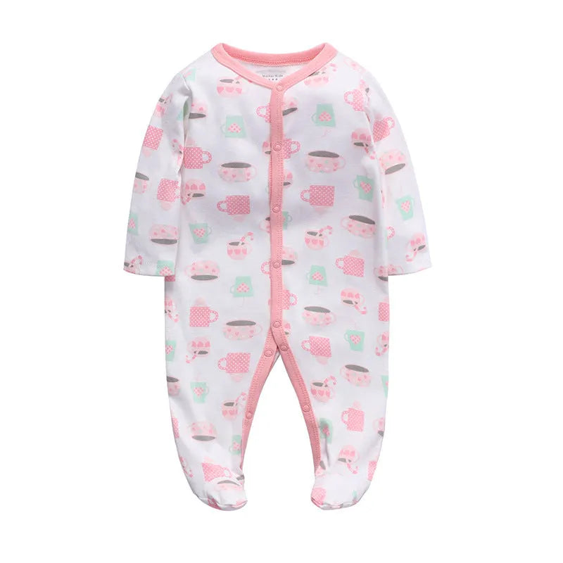 Soft cotton baby one-piece bodysuit in blue and green dinosaur print, size 6M, front view on white background