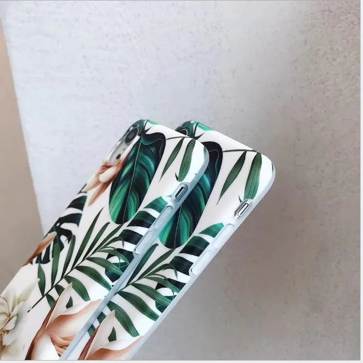 Retro floral banana leaf design on a soft TPU back case for an iPhone.