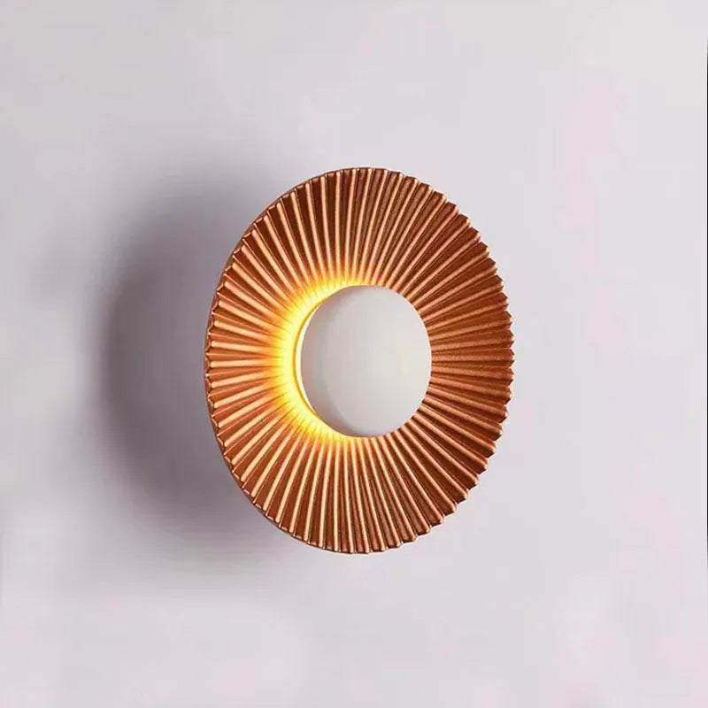Round aluminium wall lamp with LED lighting in outer white inner gold colour configuration