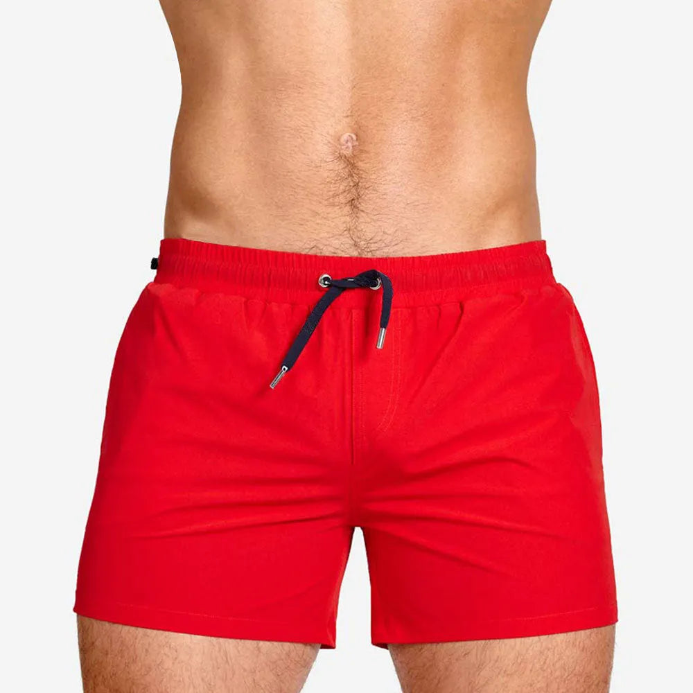 Men's solid colour polyester swimming shorts with mesh lining in army green