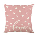 Square plaid and heart print pillow cover on a grey sofa, showing 45cm dimensions.