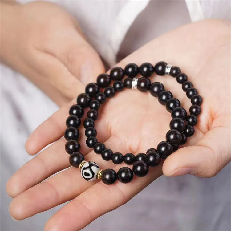 Ebony wood Tibetan prayer bead bracelet with 8mm beads in two-circle design