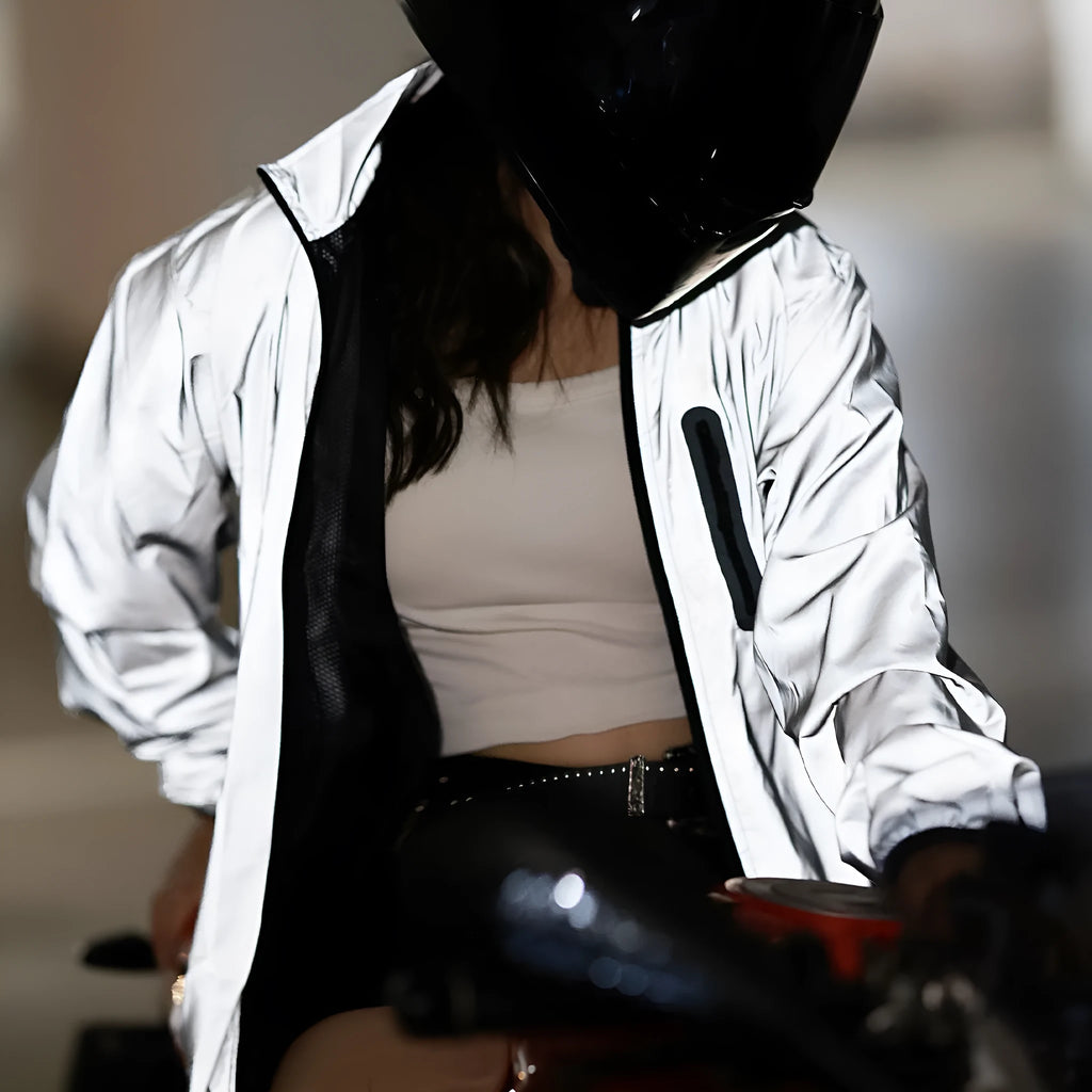 Silver waterproof polyester windbreaker jacket with long sleeves shown on a hanger.