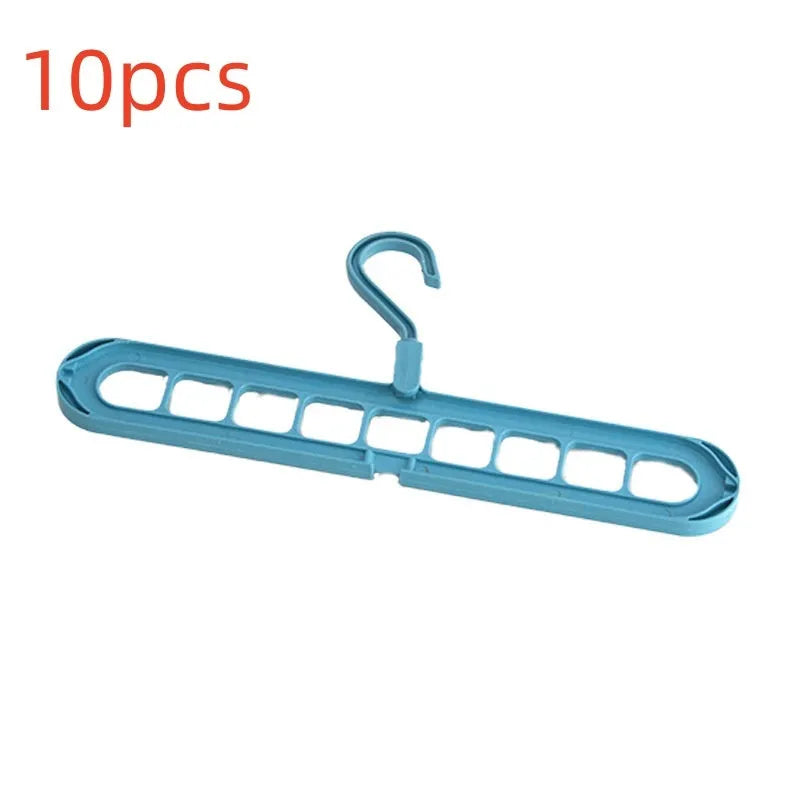 Multifunctional plastic hanger with nine holes for folding trousers, shown in beige