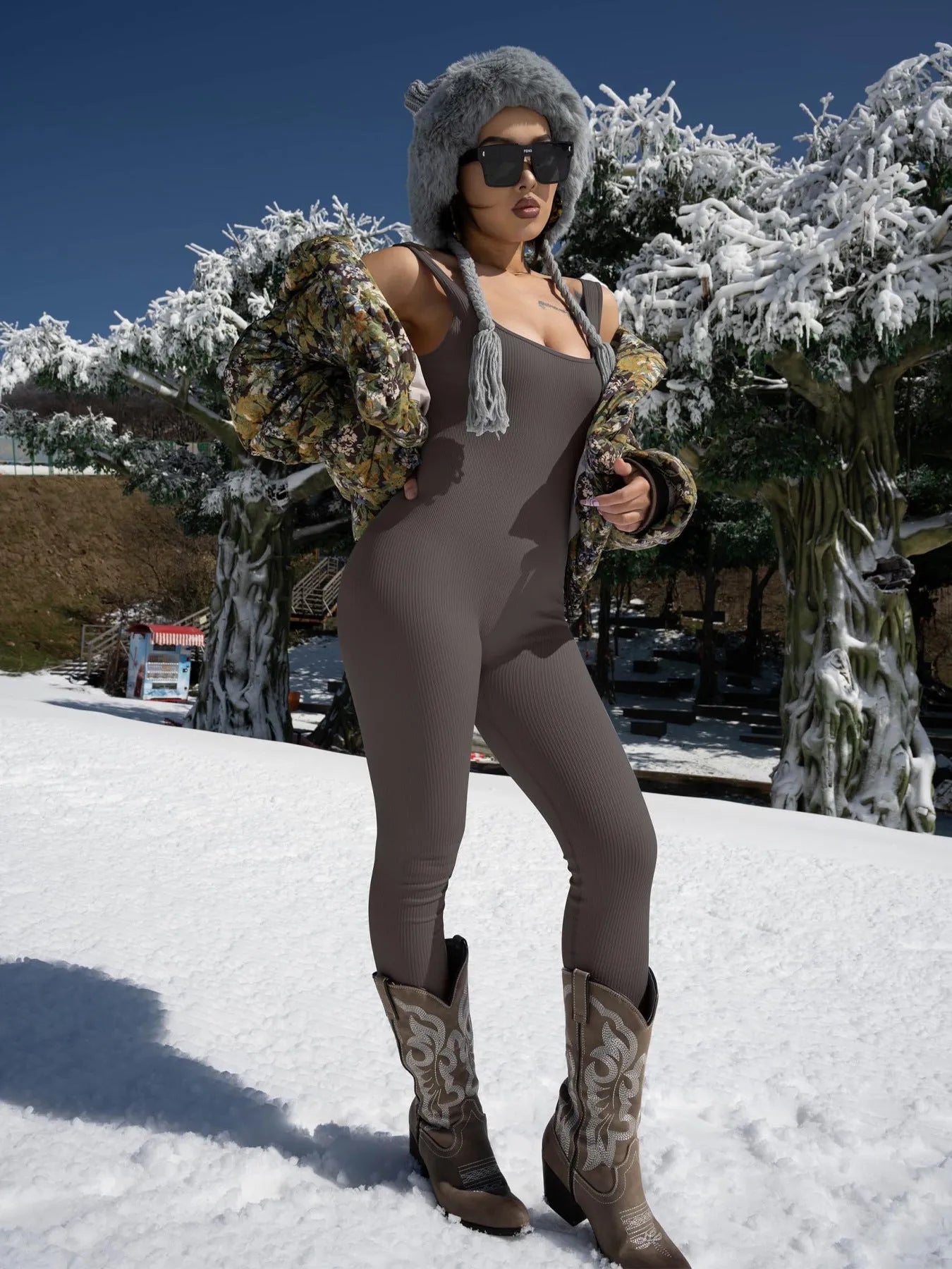 Women's beige spandex suspender tank top tights with long sleeves and button details.
