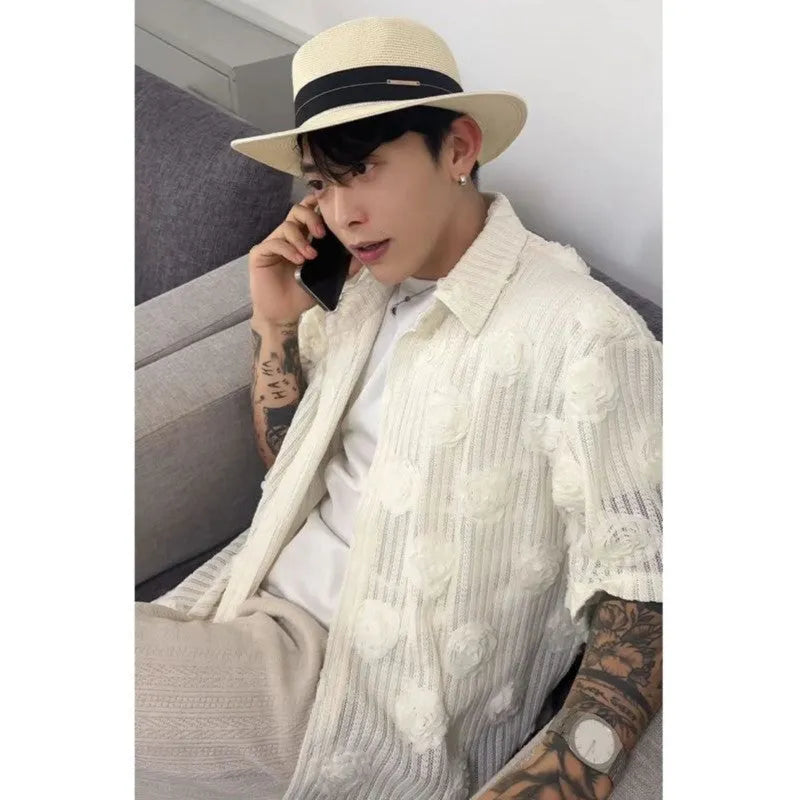 Men's loose fit short-sleeved shirt with a heavy industry floral print in milky white.