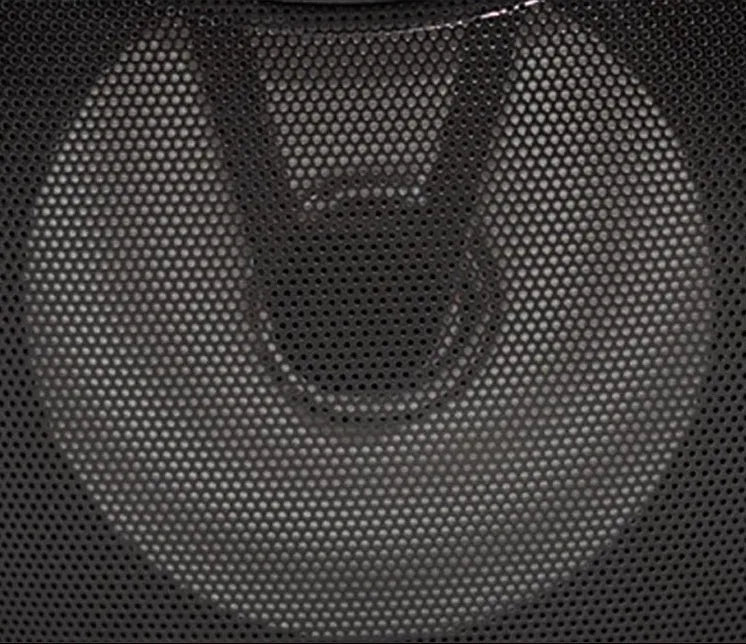Portable Bluetooth speaker in black plastic casing with USB port and control buttons