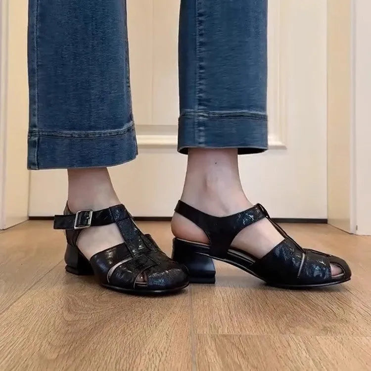 Women's Roman shoes in apricot colour with woven upper, buckle fastening, round toe, and low rubber sole