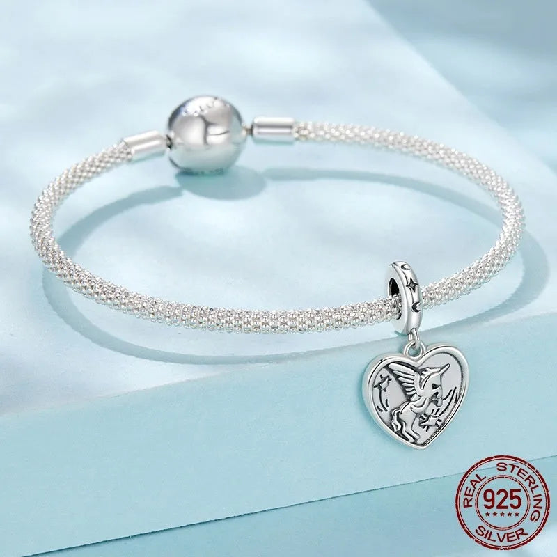 S925 sterling silver love heart bead with pearlescent finish, 2.3cm high, 1.3cm wide, 0.45cm aperture