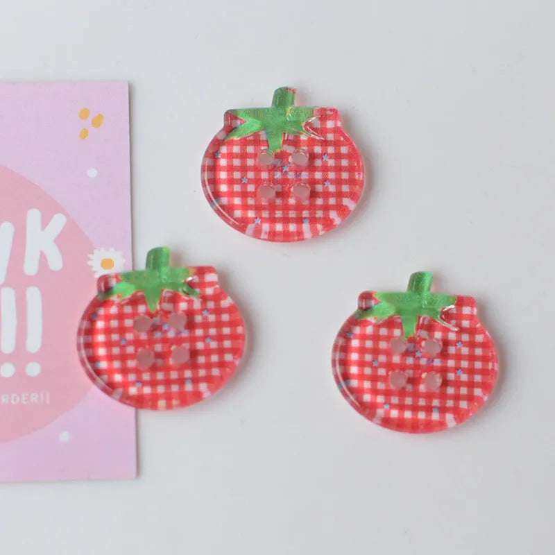 Medium plastic tomato button ornaments with printed patterns in various red colour options