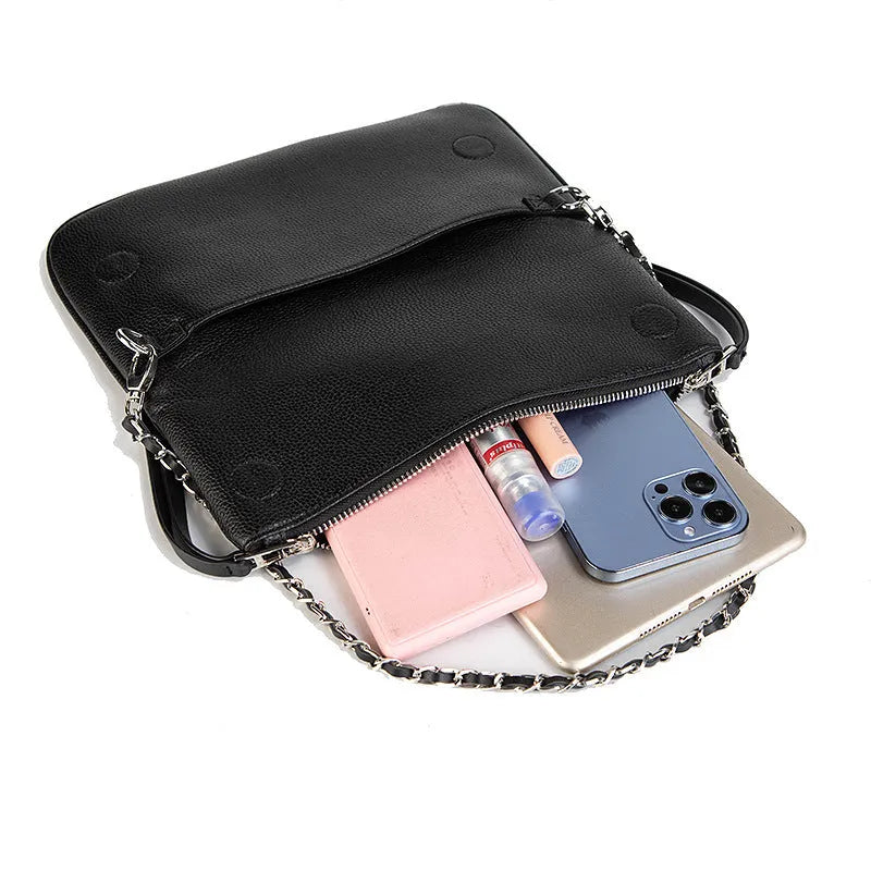 Women's black chain folding clutch shoulder bag with shell shape and crossbody strap