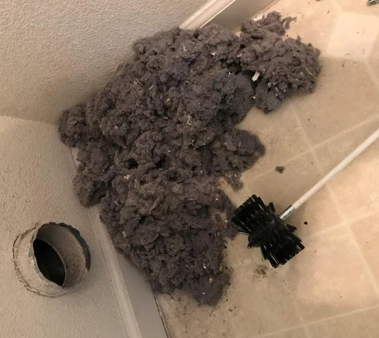 600mm long flexible dryer vent cleaning brush with nylon bristles on a bendable rod.