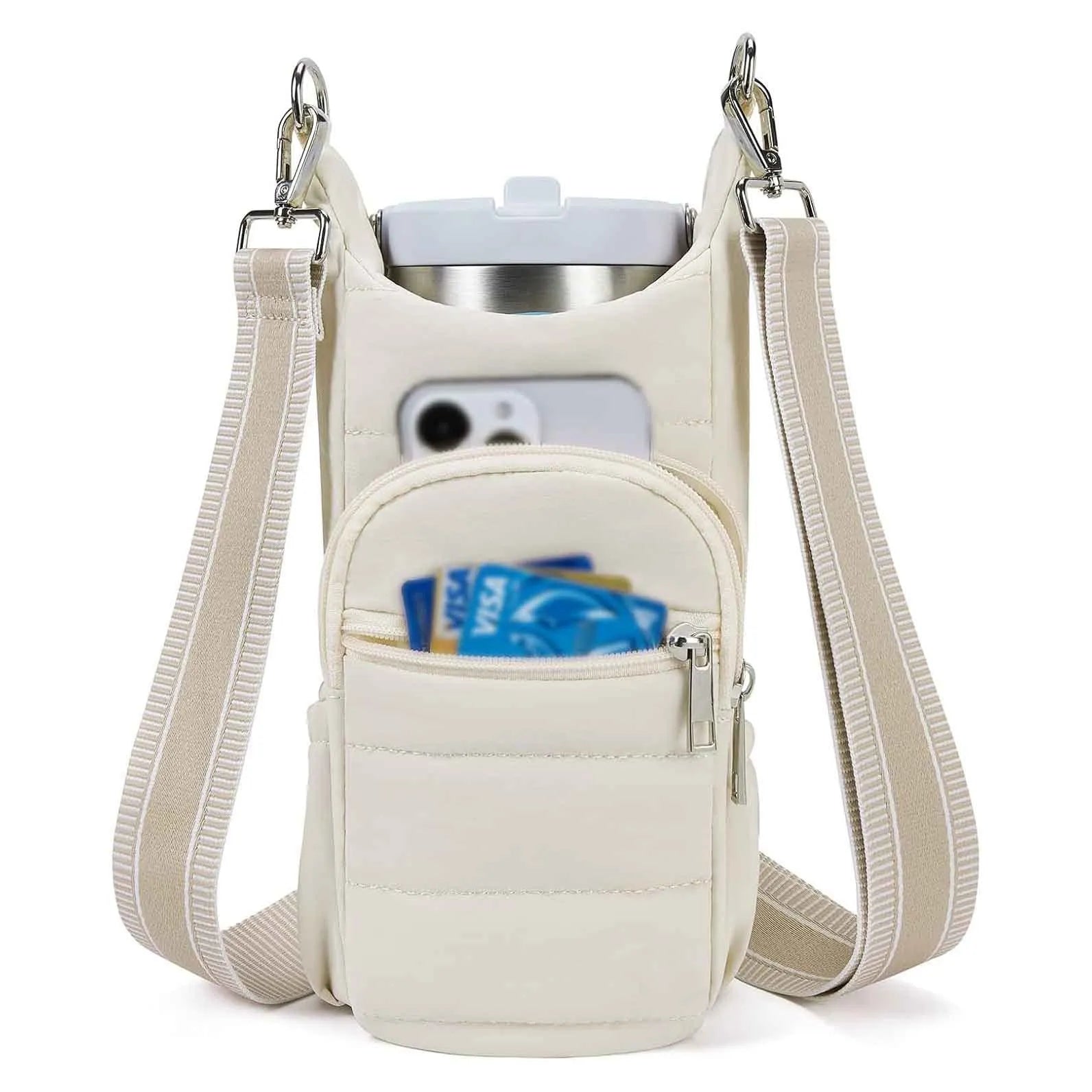 Fabric water bottle kettle bag mounted on bicycle frame in beige colour