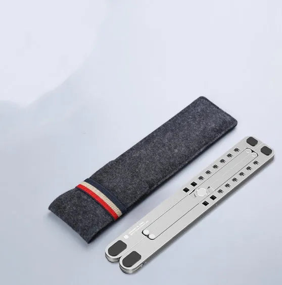 A folded and unfolded aluminium laptop stand in silver, shown next to a laptop.