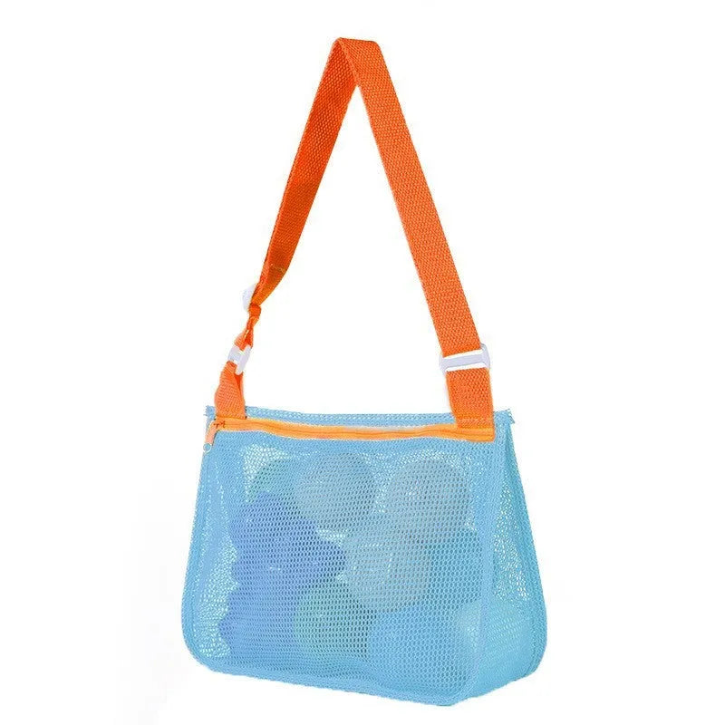 Blue nylon mesh travel storage bag with black handle and zip seal for children's clothing organisation