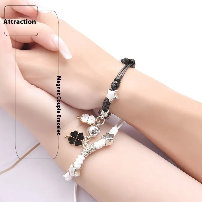 Magnetic couple bracelet pair in alloy with electroplated finish showing I love you design and crown style options