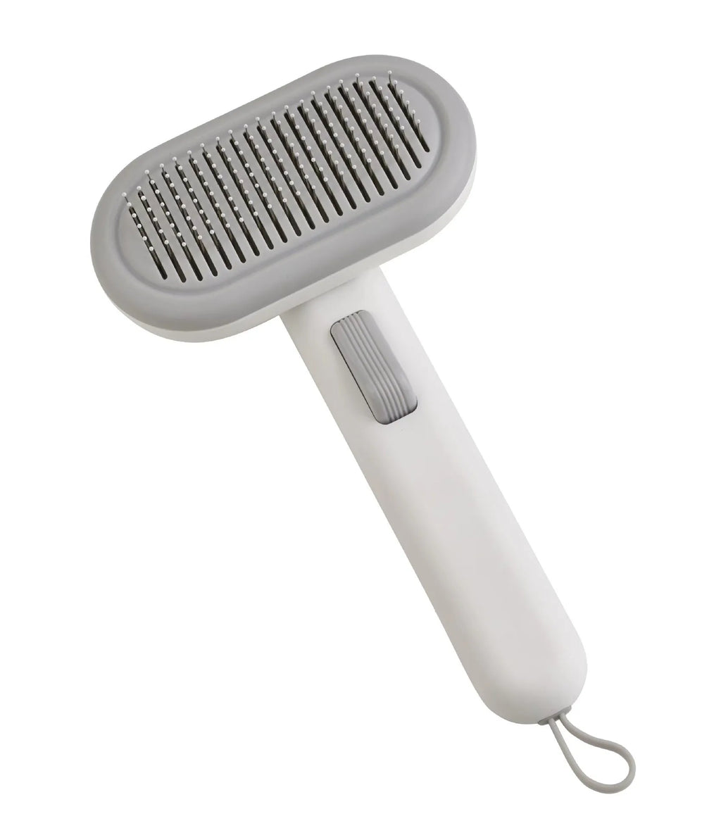 Large pet hair removal comb with stainless steel blade and one-click shaver for cats and dogs in light grey colour